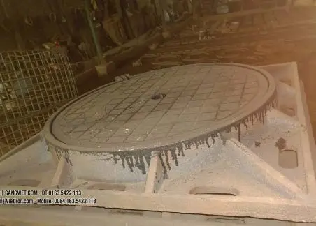 Cast iron manhole covers and drainage