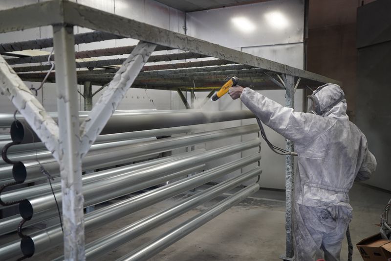 Powder coating metal surfaces